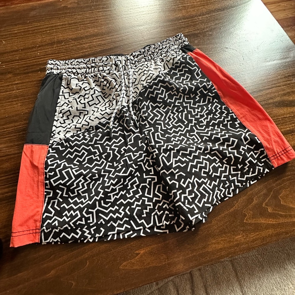 Chubbies Black and White Patterned Athletic Shorts with Red Accents